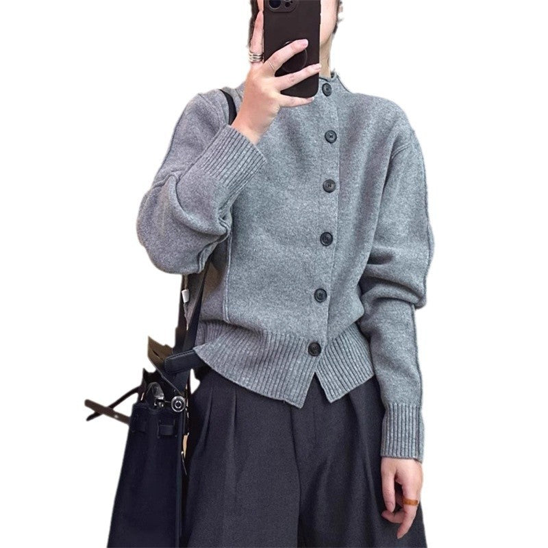 Cardigan pour dames avec fermeture à boutons et détails côtelés Chic & Stil