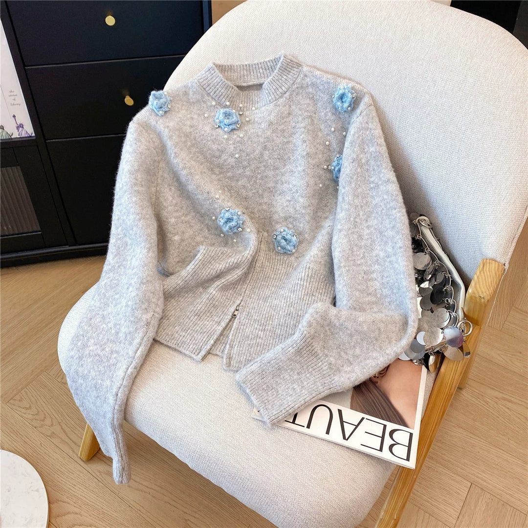 Sweater stylé pour femmes avec des applications florales Chic & Stil