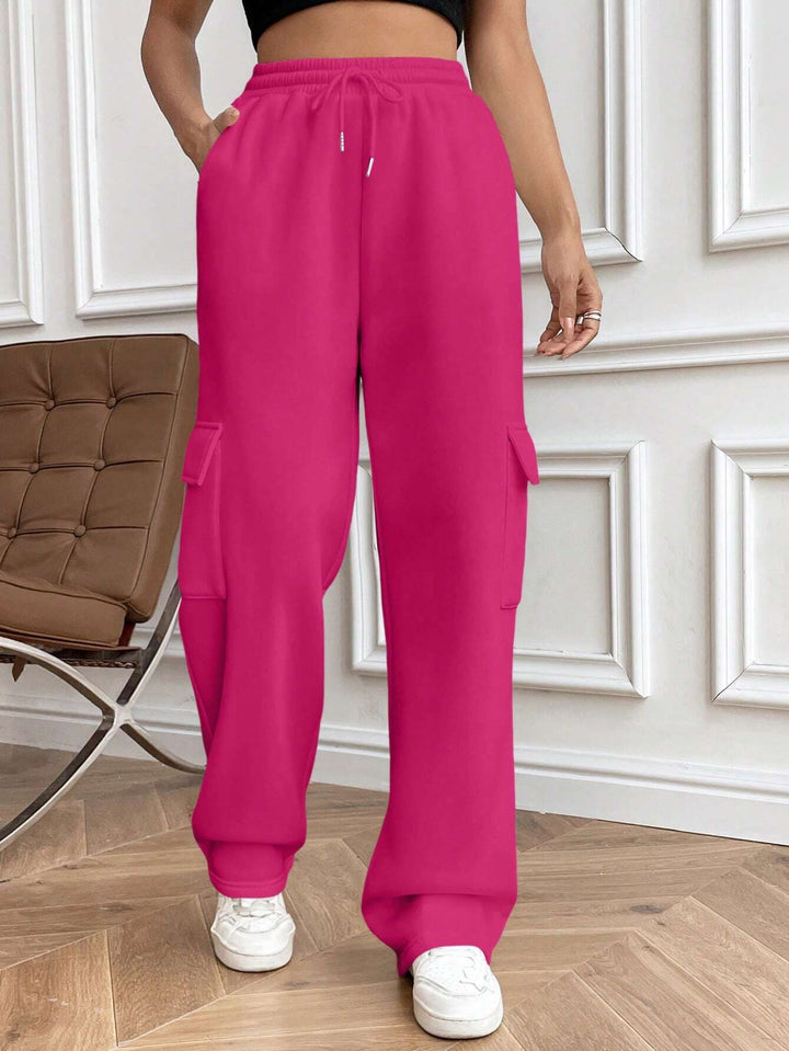 Ladies cargo jogging pants with high elastic waistband, drawstring, and wide leg Amarae