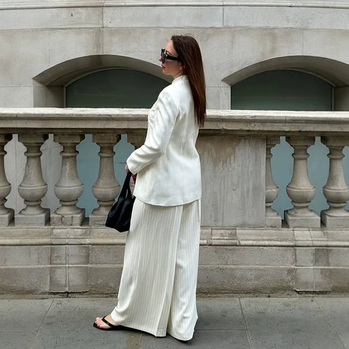 Women's tailored long blazer with a stand collar, boxy shoulder, and concealed button placket Amarae