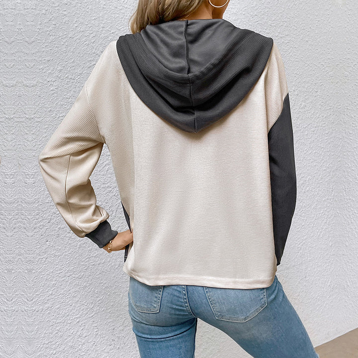 Casual women's top with hood and button placket Lune London