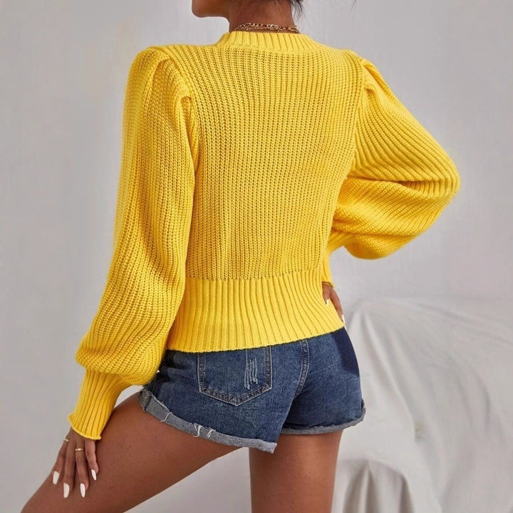 Pull en tricot épais pour femmes avec des manches volumineuses et un motif en cable Chic & Stil