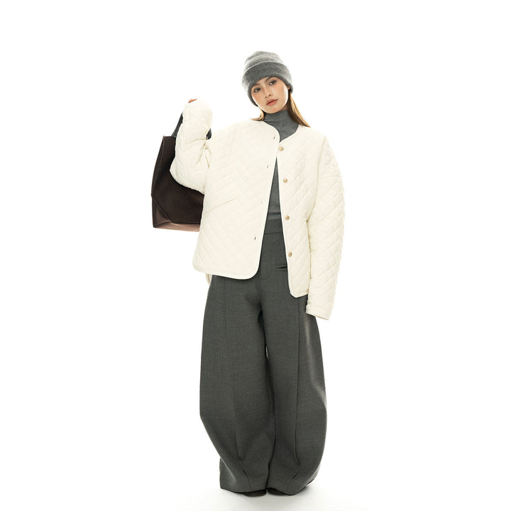 Women’s light padded oversized quilted jacket with round neckline and patch pockets Amarae