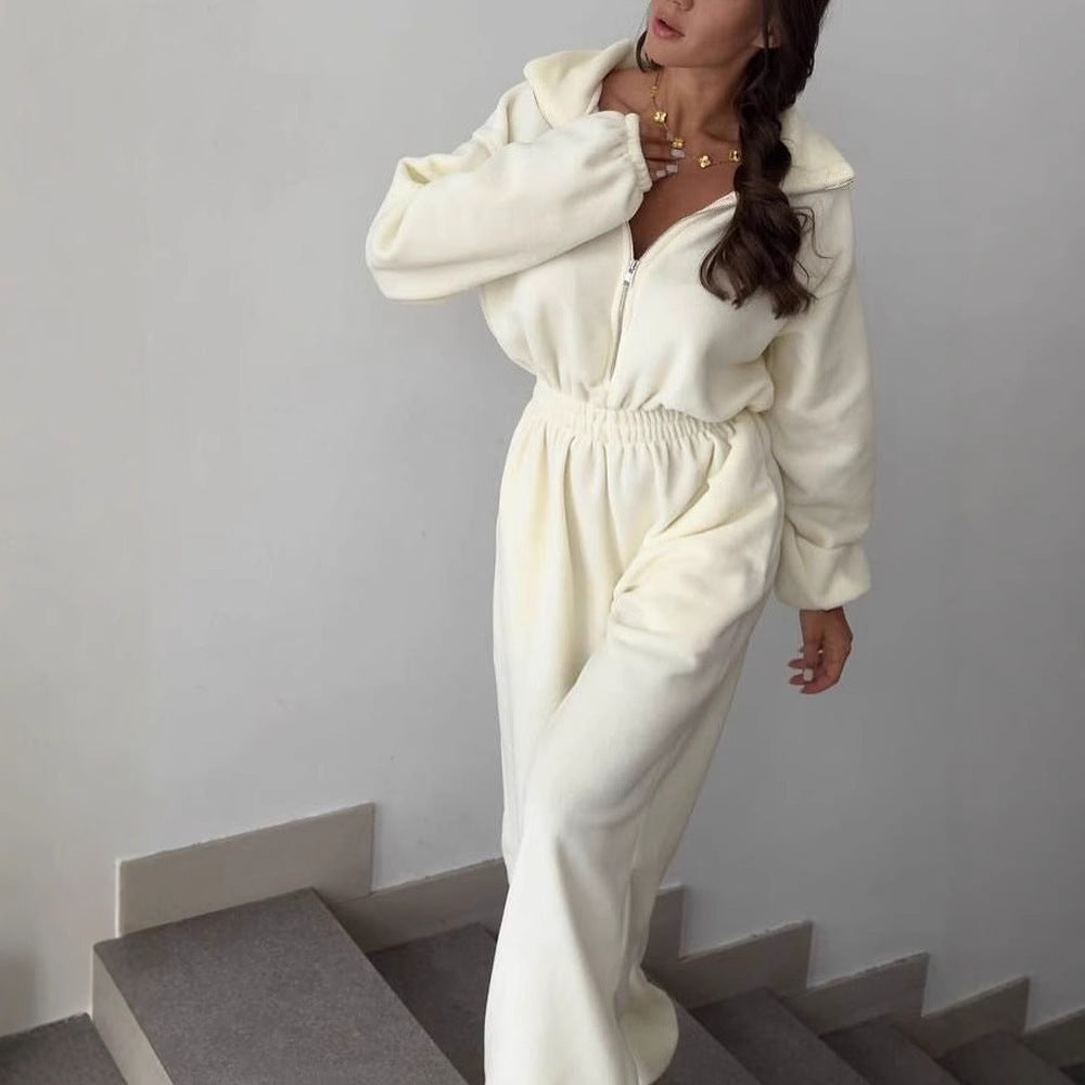 Ladies fleece jumpsuit with large puff sleeves and a high collar Lune London