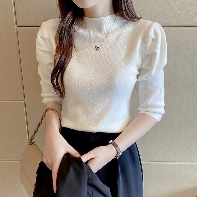 Haut élégant pour femmes avec des manches bouffantes et un tricot de haute qualité Chic & Stil