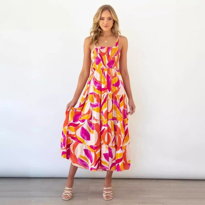 Maxi dress inspired by boho for women with colorful floral pattern and elastic top Chic & Stil