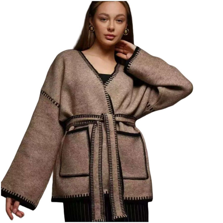 Thick knitted coat for women with practical belt and pockets Lune London