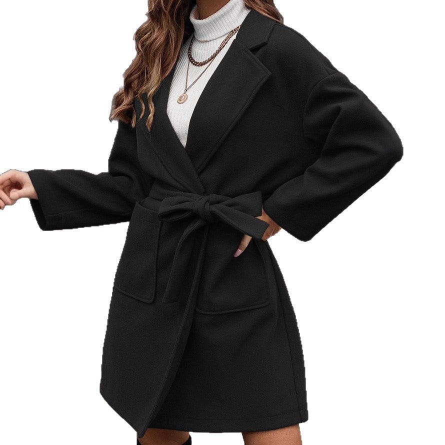 Ladies wrap coat with tie belt, large flap pocket and lapel collar Amarae