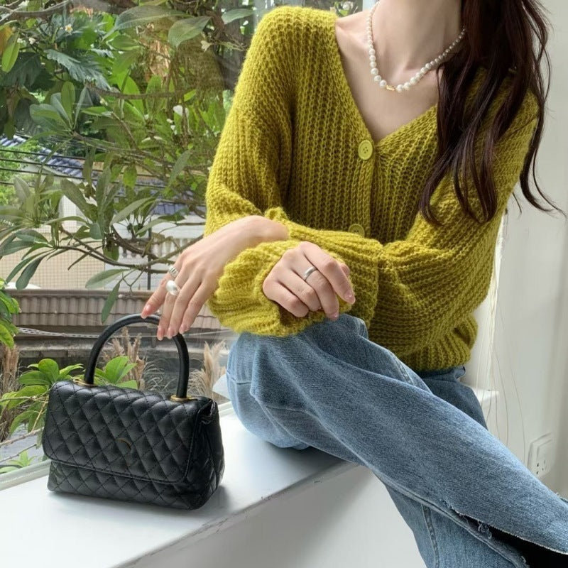 Cardigan décontracté pour femmes en maille épaisse avec des boutons pratiques Chic & Stil