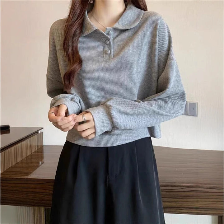 Pull polo décontracté pour femmes avec détails de boutons Chic & Stil