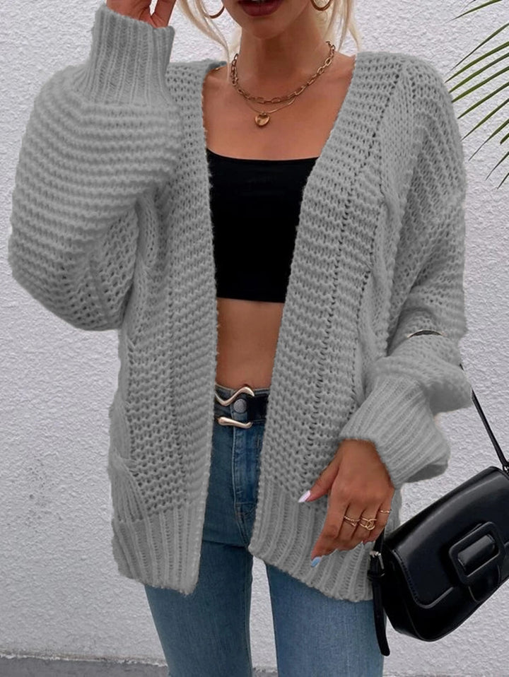 Ladies long sleeve knitted vest with a relaxed fit and large pockets Lune London