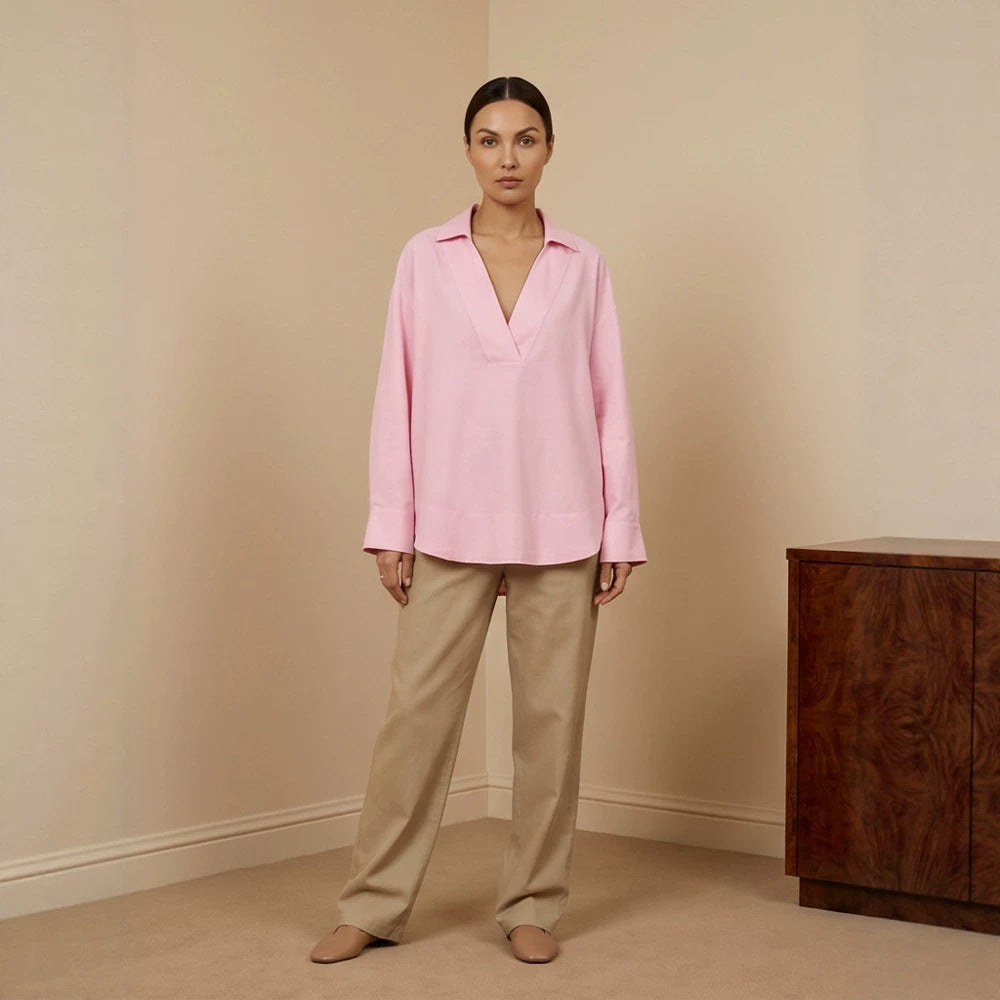 Women's loose-fitting tunic blouse with V-neck, shirt collar, and extended back hem Amarae