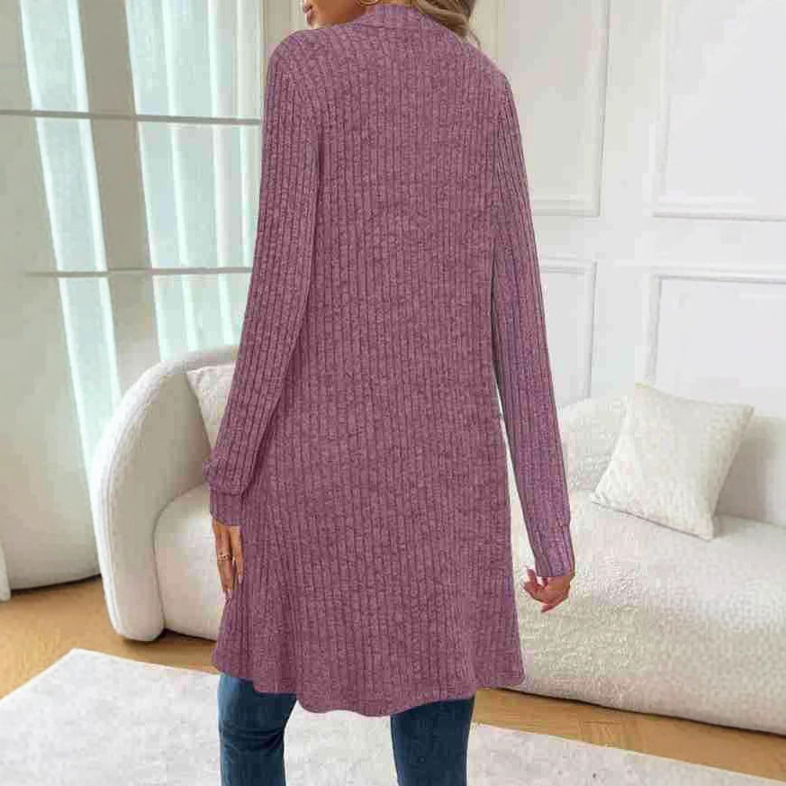 Long knitted jacket for women with side pockets and textured design Lune London
