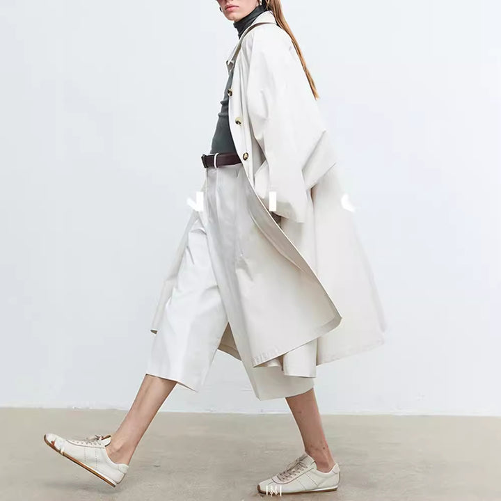 Manteau de trench décontracté pour femmes avec des manches surdimensionnées et des détails de boutons Chic & Stil
