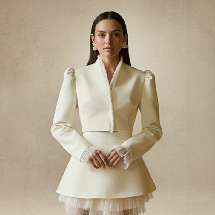 Ladies short blazer with tailored cropped silhouette, gathered shoulders and delicate tulle cuffs Amarae