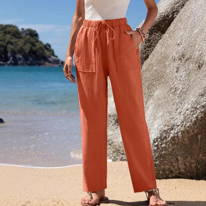 Loose beach pants for women with elastic waistband and practical pockets Lune London