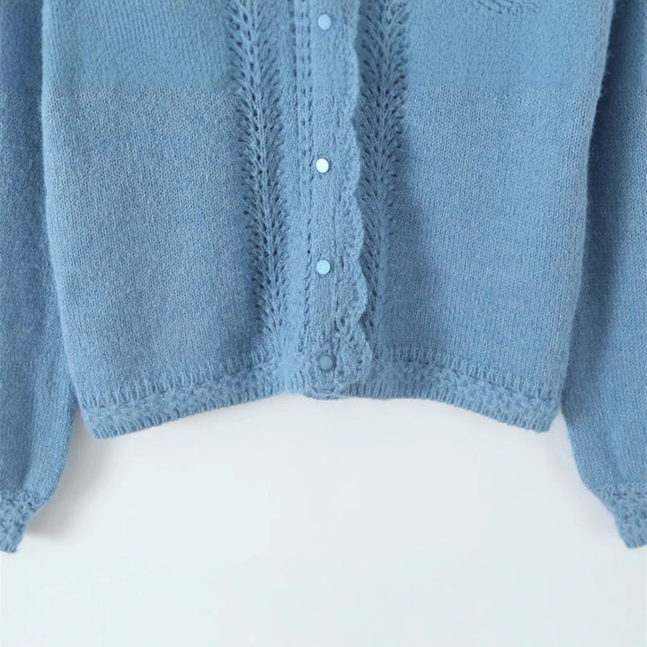 Women's knitted jacket with romantic openwork patterns and Lune London button details