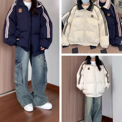 Lady sporty quilted jacket with contrasting bands and a high collar Amarae