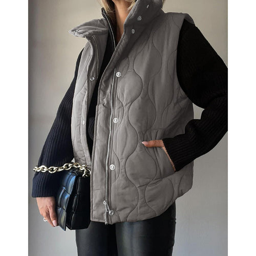 Quilted vest for women with high collar and practical pockets Amarae