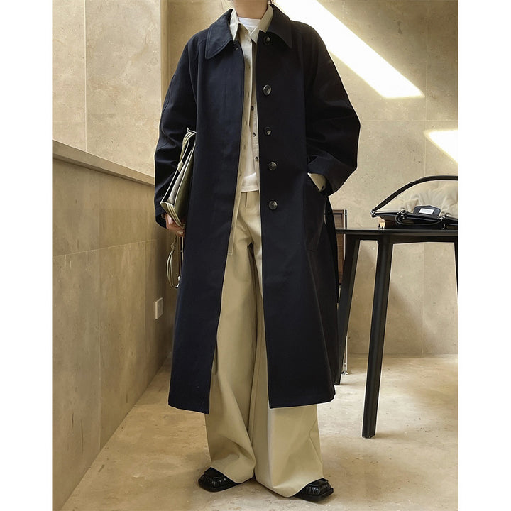 Women's longline coat in minimalist trench style with side pockets Amarae