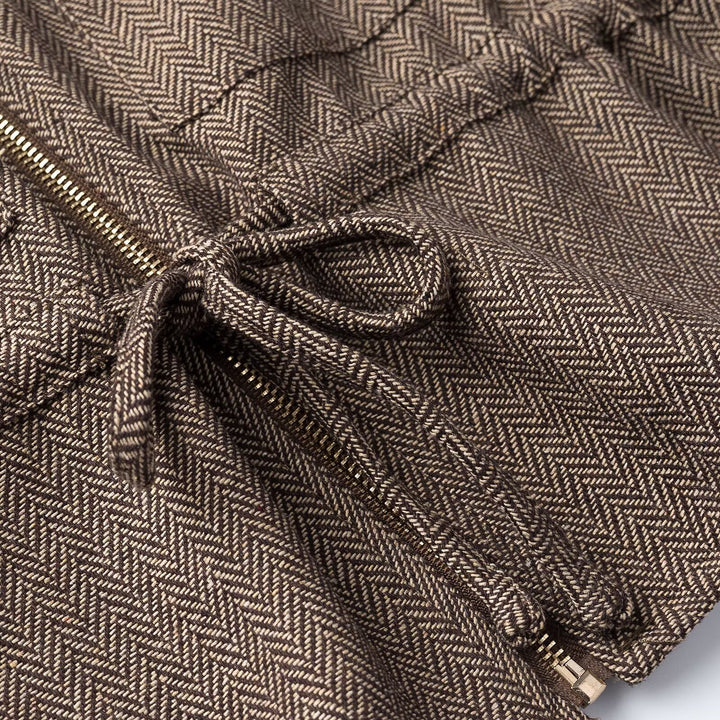 Women's short-sleeved tailored transition jacket with zipper, drawstring, and patch chest pockets Amarae