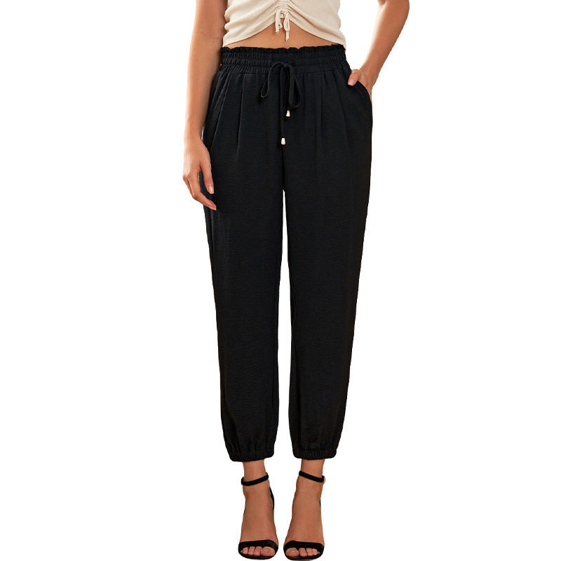 Sporty chino pants for women with elastic waistband and side pockets Lune London