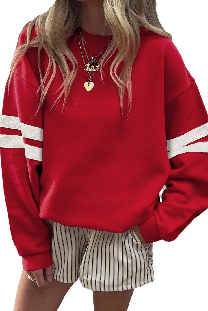 Oversized sporty sweater for women with striped accents and a casual fit Lune London
