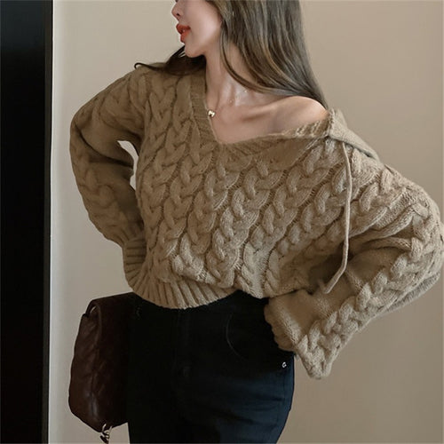 Poncho en tricot épais pour femmes avec capuche et design contemporain Chic & Stil