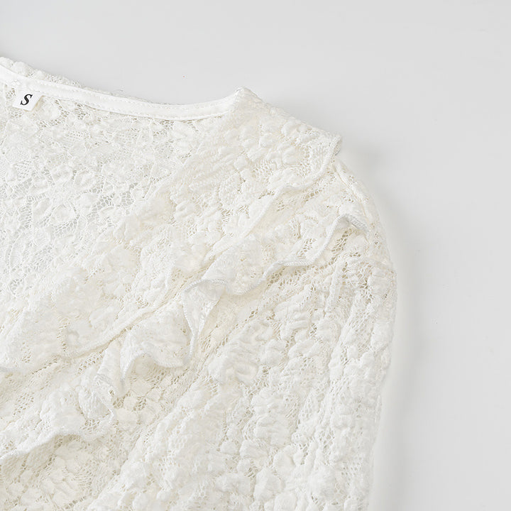 Ladies figure-hugging lace blouse with ruffle V-neck and tie detail Amarae