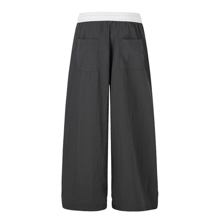 Women's wide loungewear pants with high comfort waistband, drawstring, adjustable hem, and typographic print Amarae