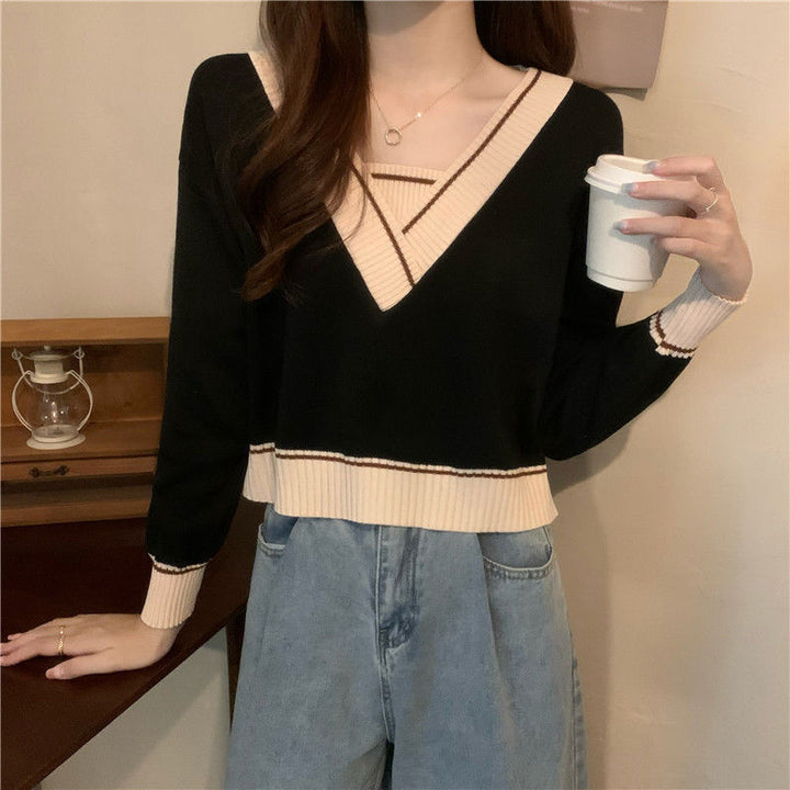Pull féminin à la mode en V avec détails contrastés Chic & Stil