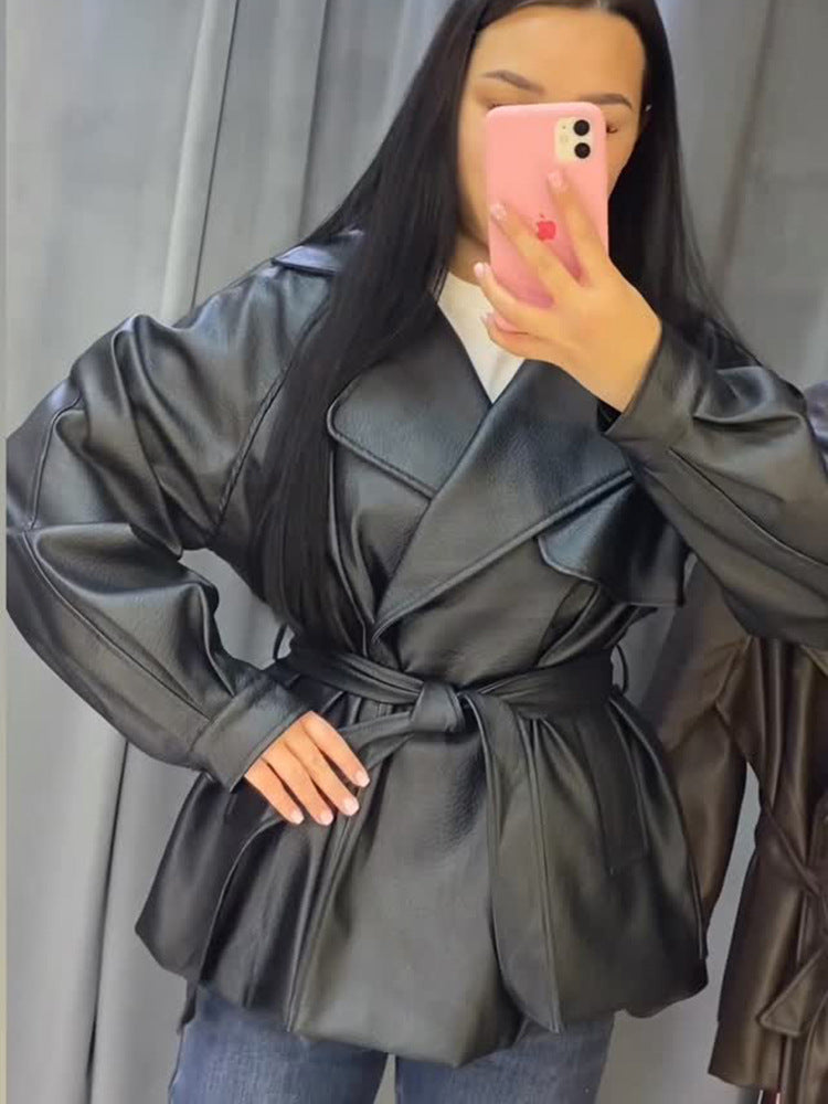 Women's Short Faux Leather Wrap Jacket with Waist Belt and Oversized Lapel Amarae