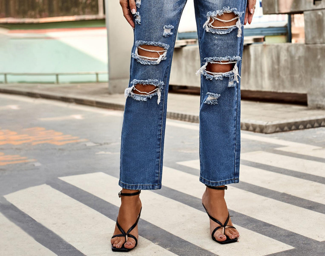 Women’s relaxed fit jeans with ripped elements and high waist Lune London