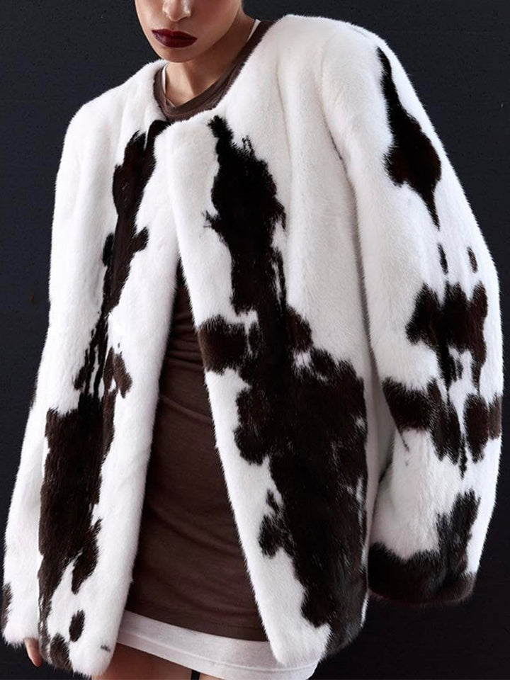 Women's short coat made of faux fur with boxy silhouette and cow print pattern Amarae