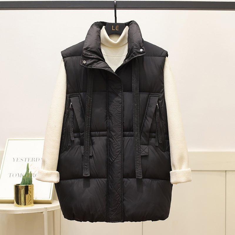 Quilted women's gilet with high collar and practical pockets Lune London
