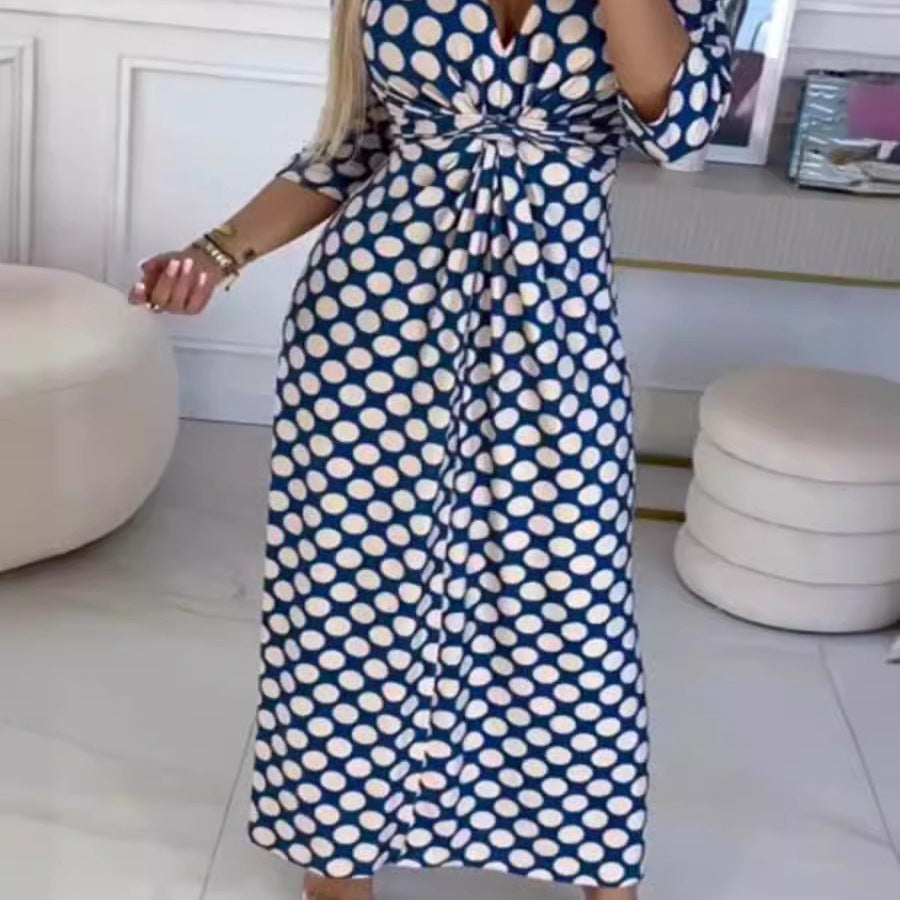 Maxi dress for women with a modern polka dot pattern and an elegant crossover appearance Lune London
