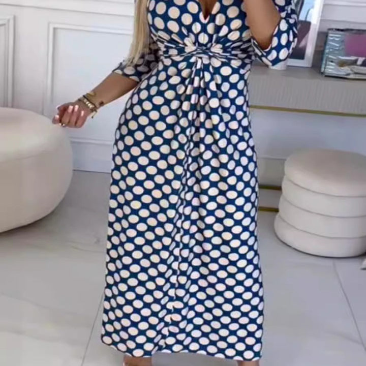 Maxi dress for women with a modern polka dot pattern and an elegant crossover appearance Lune London