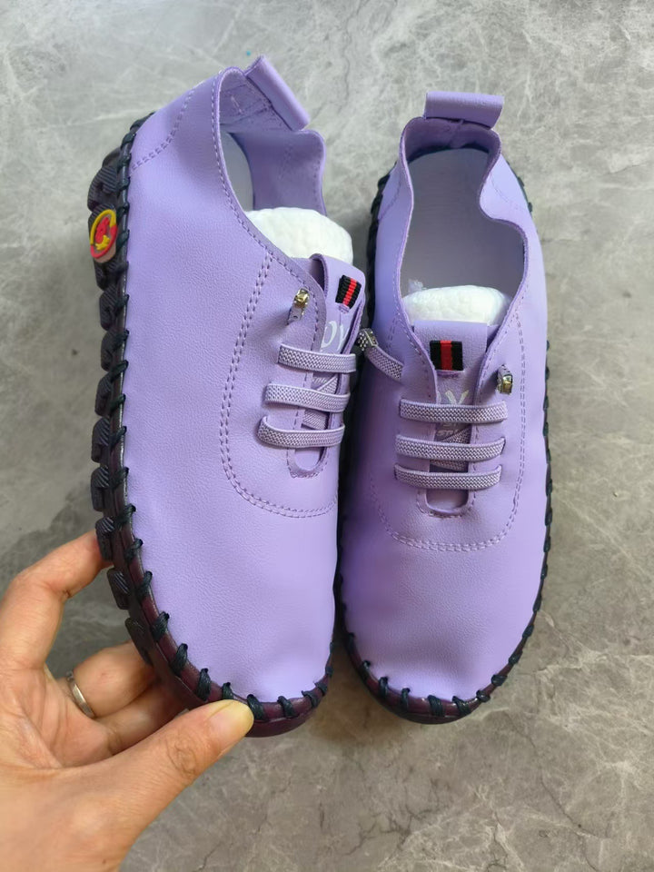 Women's lightweight, soft slip-on with hand-stitched rubber sole and elastic lacing Amarae