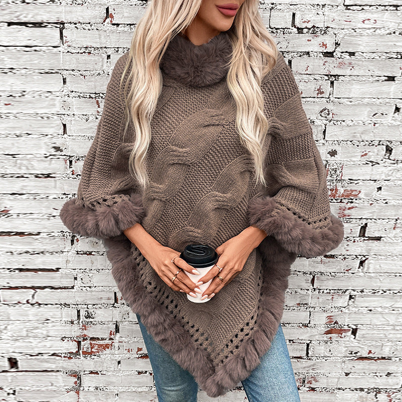 Ladies cozy poncho sweater with soft faux fur trim and cable knit pattern Lune London