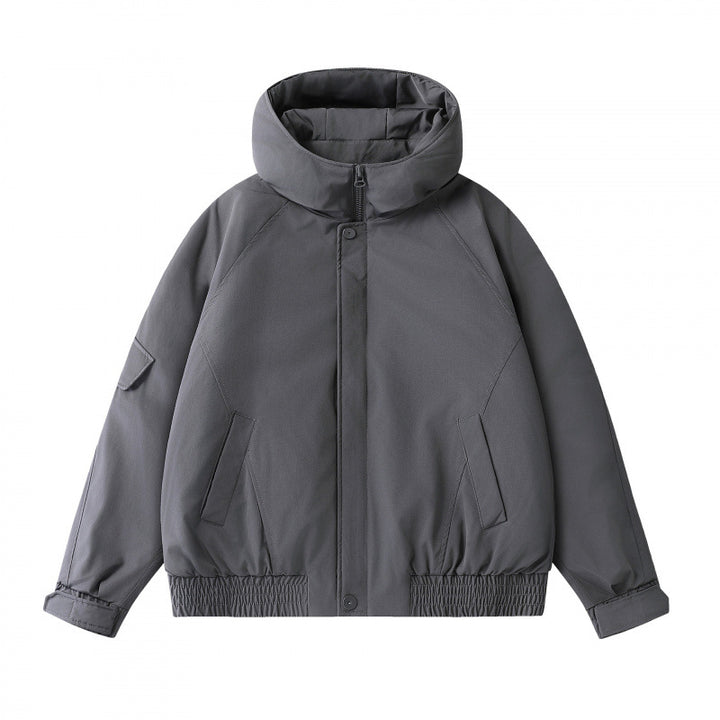 Unisex Boxy padded transition jacket with high stand-up collar, quilted lining, and elastic hem Amarae