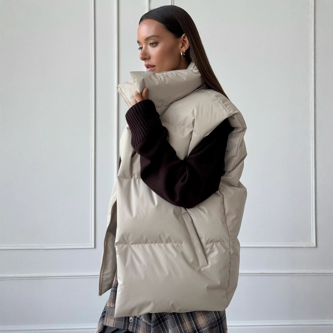 Ladies padded vest with high collar and practical side pockets Lune London