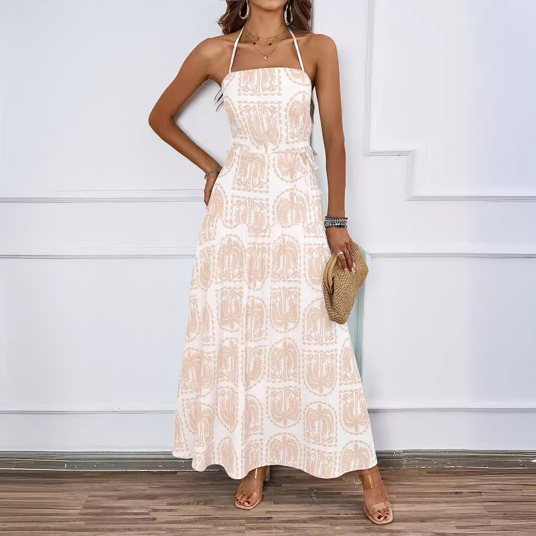 Women's maxi dress with fine graphic print and adjustable halter neck Chic & Stil