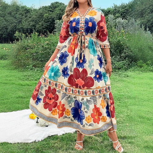 Women's maxi dress with colorful floral design and waist belt Amarae