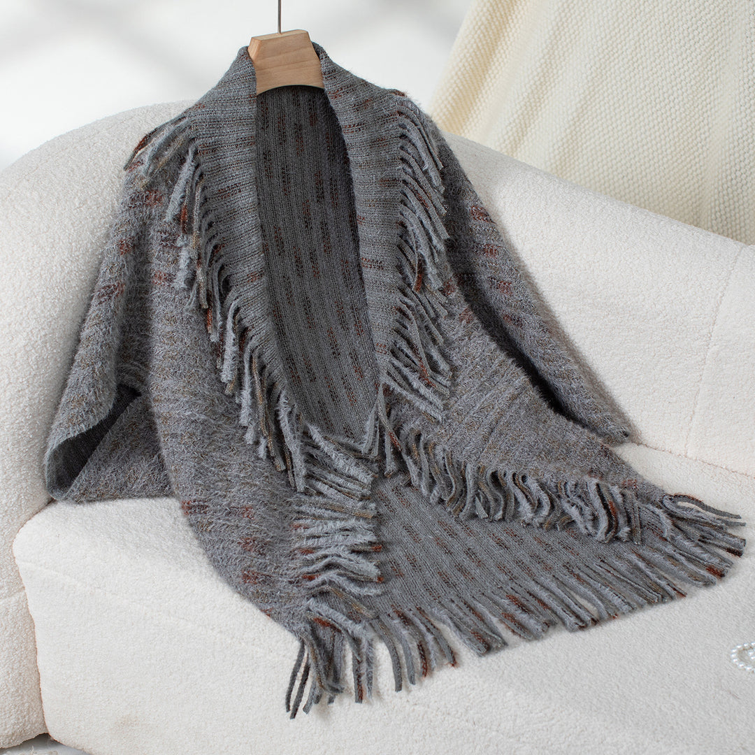 Ladies elegant poncho with fringed details and a modern plaid pattern Lune London