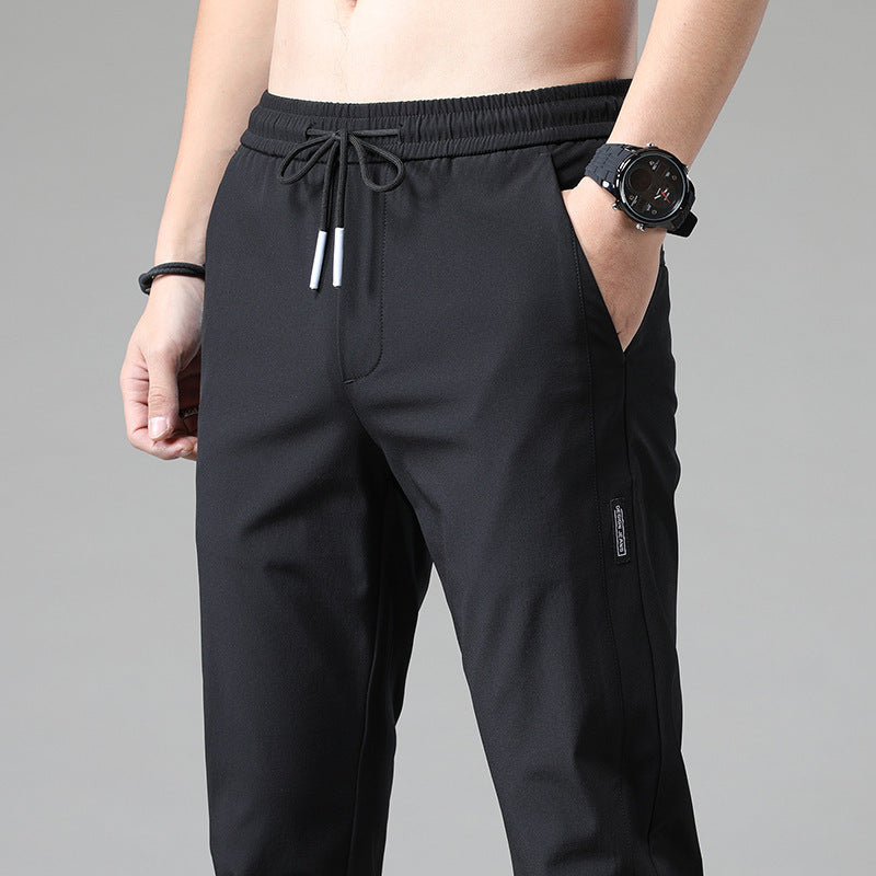 Men's sports pants with adjustable drawstring and zippered pockets on the sides Lune London