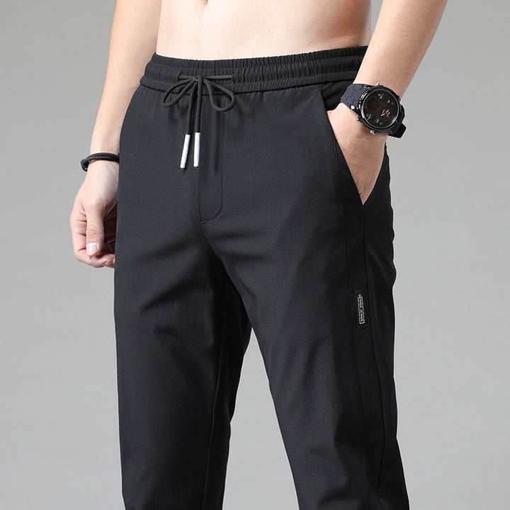 Men's sports pants with adjustable drawstring and zippered pockets on the sides Lune London