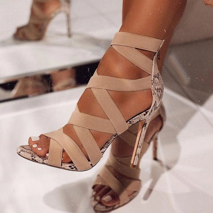 Platform sandals for women with adjustable straps and an elegant snake leather design Lune London
