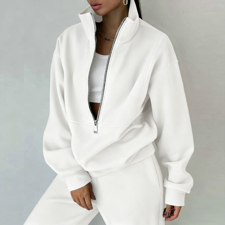 Women's sporty sweatshirt with high collar and practical zipper Chic & Stil