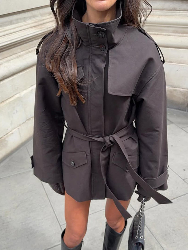 Women's Short Tailored Trench Jacket with Stand-Up Collar, Flap Pockets and Tie Belt Amarae