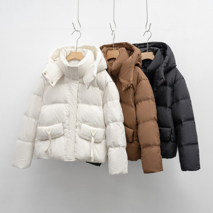 Ladies insulated quilted jacket with practical pockets and hood Lune London